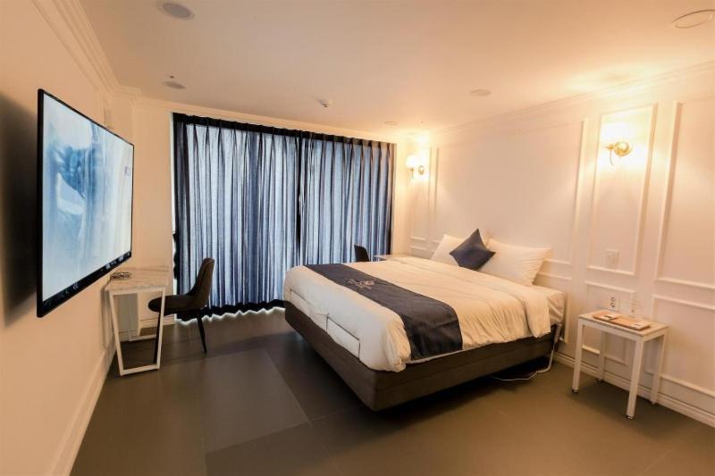 Gladsheim Hotel Seogwipo Extérieur photo